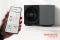 Viessmann heatpump Vitocal 200A and a hand holding a samrt phone with the Vicare App opened. 