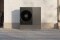 Viessmann heatpump in front of a house wall